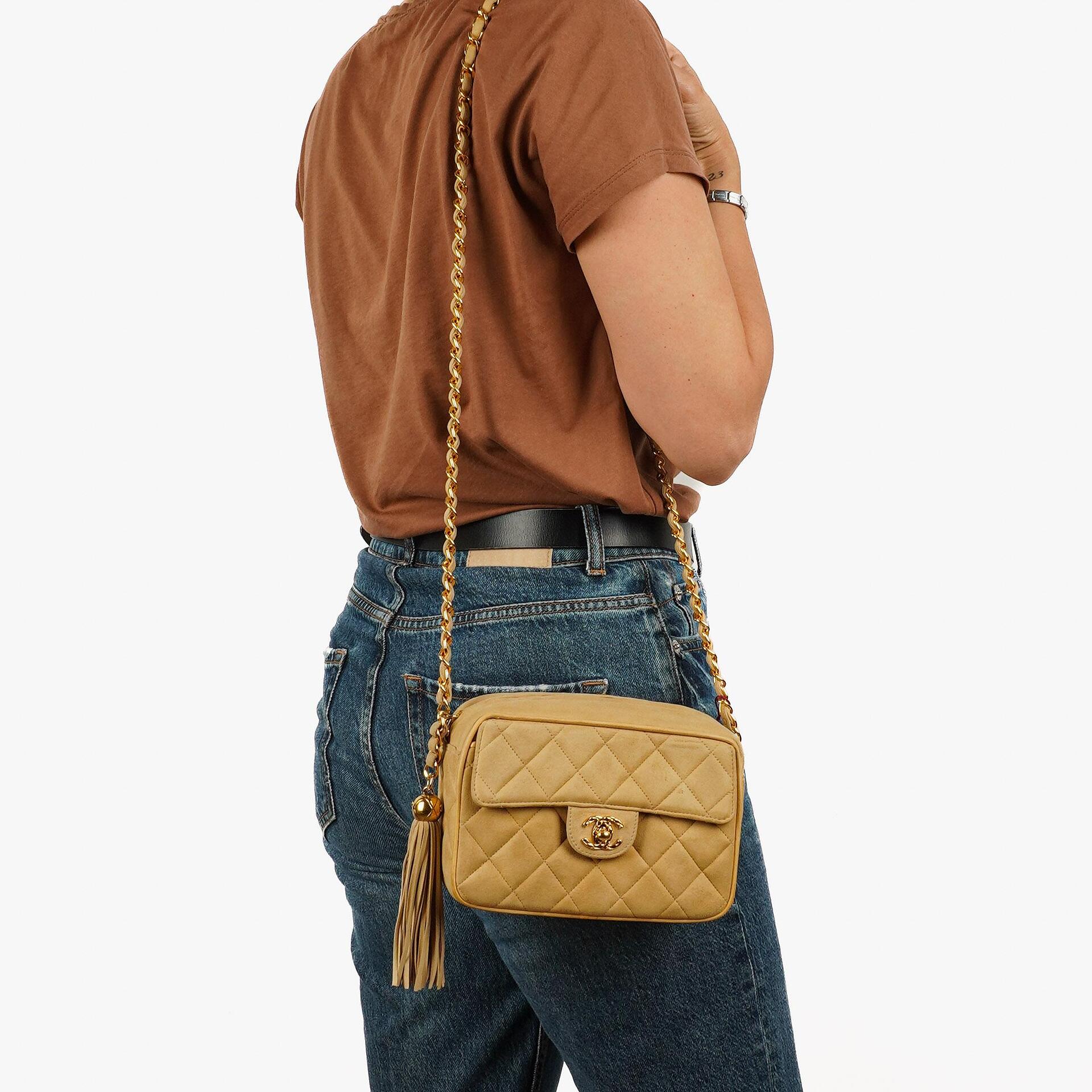 Chanel Vintage Small Camera Tassel Bag In Gold Quilted Suede With CC Logo Front Pocket