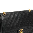 Chanel Vintage Timeless Classic Medium Double Flap Bag Black Quilted Lambskin With 24K Gold-Plated Hardware And Mademoiselle Chain