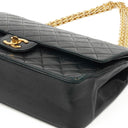 Chanel Vintage Timeless Classic Medium Double Flap Bag Black Quilted Lambskin With 24K Gold-Plated Hardware And Mademoiselle Chain