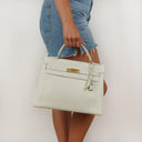 Hermès Kelly 32 Retourne White Leather With Gold Hardware, 1977