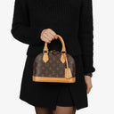 Louis Vuitton Alma BB Monogram Canvas Handbag