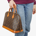 Louis Vuitton Alma PM Monogram Canvas Handbag