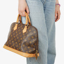 Louis Vuitton Alma PM Monogram Canvas Handbag